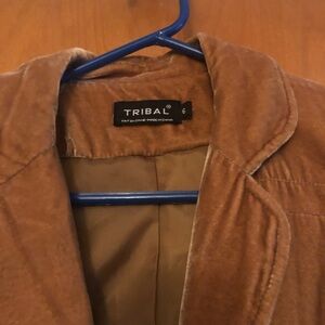 Tribal jacket. Check out the detail on the front and back. Battle jacket length.